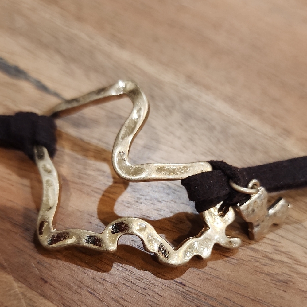 Louisiana Gold-Tone Star Bracelet with Brown Cord
